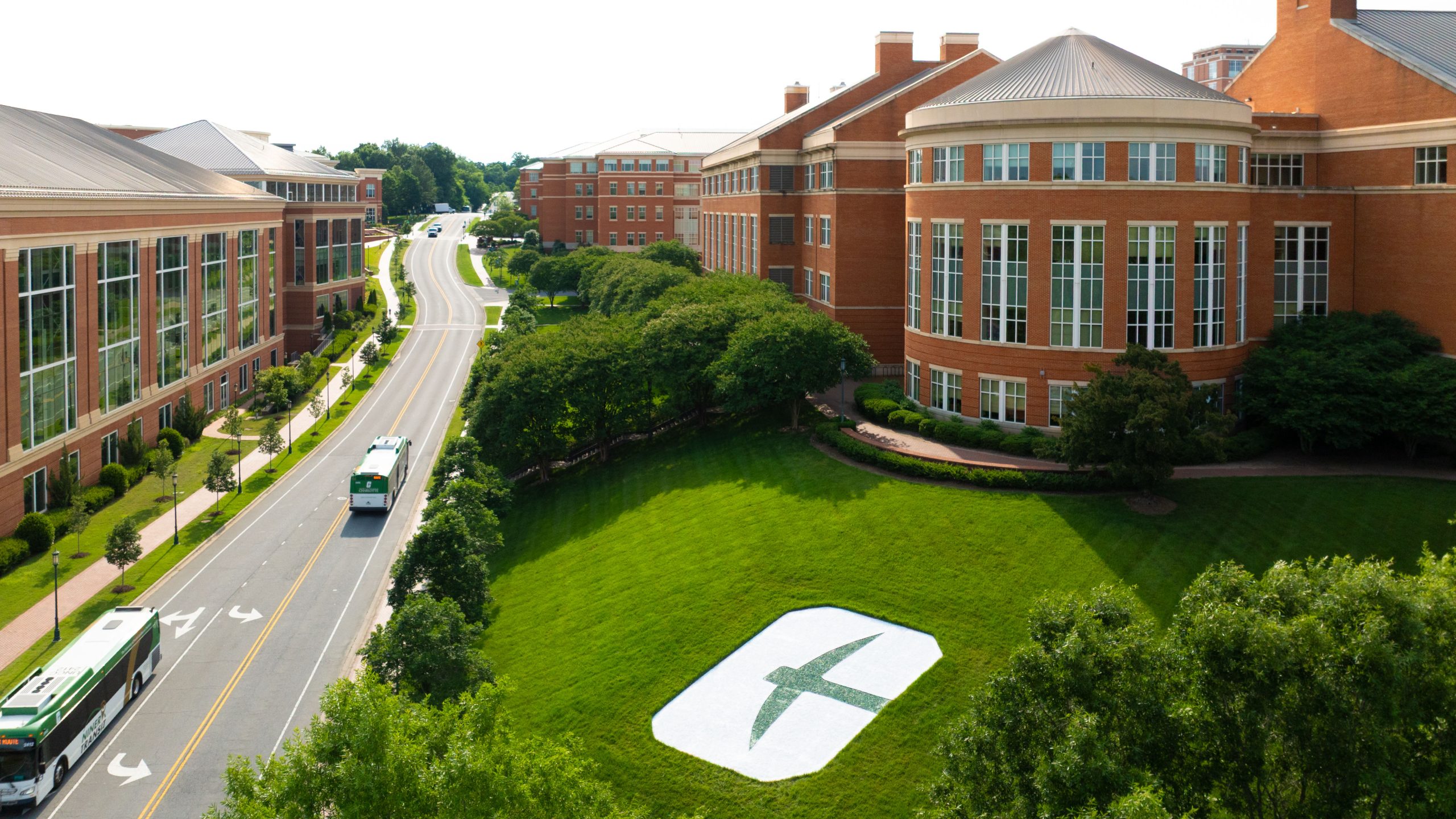 Picture of UNC Charlotte logo on hillside.