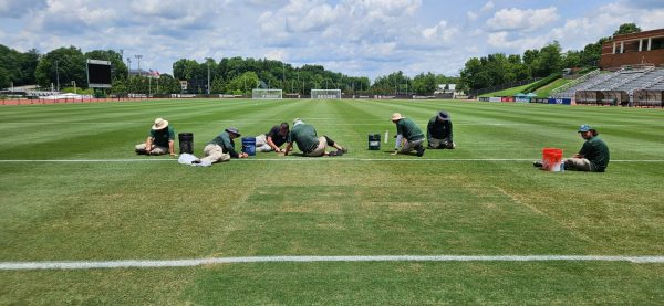 Grounds crew works on soccer fields